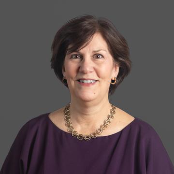 Portrait of Cathy Racine, Executive Assistant and Group Manager